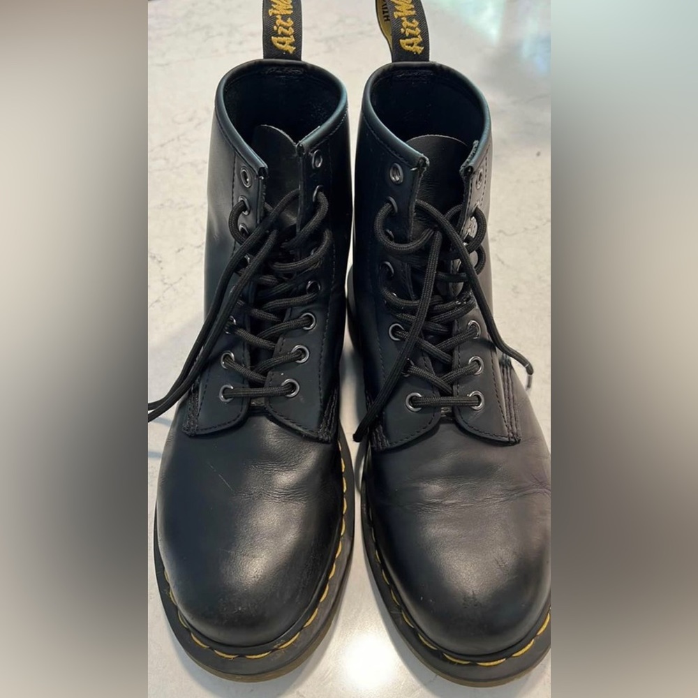 Vegan leather Dr. Martens size women’s 9, men’s 8. Scuffs on front.